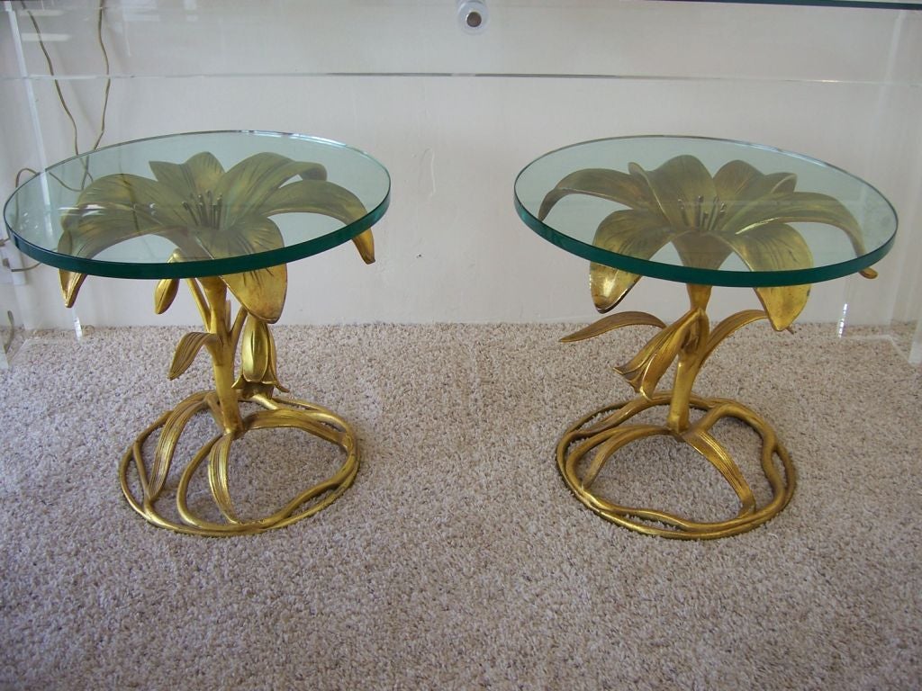 A Pair of Hollywood Regency Gilded Flower Sidetables