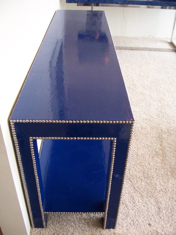 A Long Studded Vinyl Console