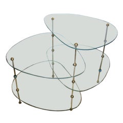 A Multi Tiered Glass Modernist Occasional Table
