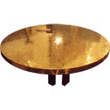 A Large Round Cocktail Table in Gilt Brass by Jean Claude Dresse