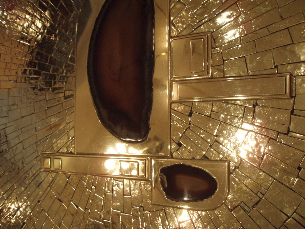 A Large Round Cocktail Table in Gilt Brass by Jean Claude Dresse