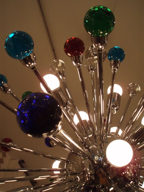 A Modernist Chrome and Multi Colored Glass Sputnik Chandelier In Excellent Condition In New York, NY