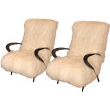 A Pair of Mid Century Armchairs in Tibetan Lamb