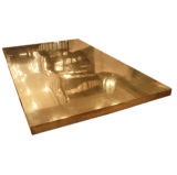 A Large Rectangular Bronze Topped Cocktail Table