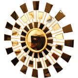 A Large Sunburst Wall Mirror in Clear and Black Mirror