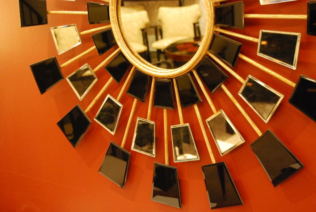 Mid-20th Century A Large Sunburst Wall Mirror in Clear and Black Mirror