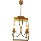 A Two Light Chandelier in Crystal and Gilt Brass by Fontana Arte