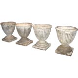 Set of 4 stone Urns