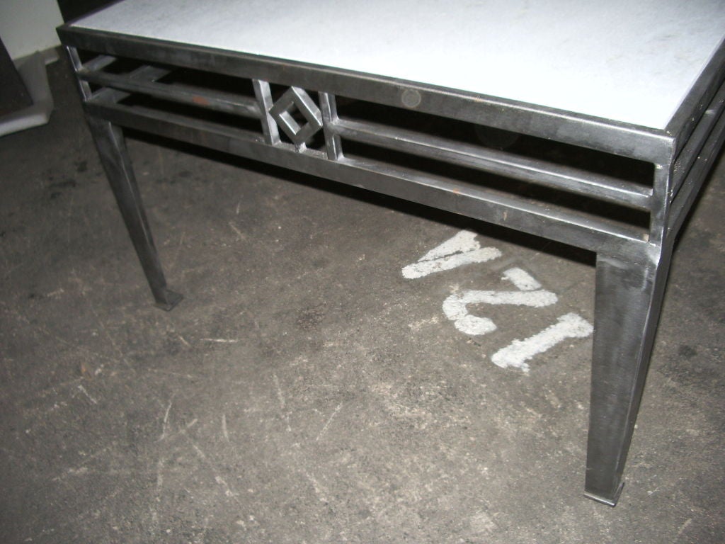 Polished metal and stone coffee table