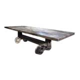 Vintage Industrial Dining Table With Train Wheel Legs