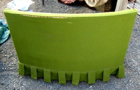 Very modern curved back setee with great architectural lines.