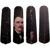 Four Fan Blades covered in Oil Portrait