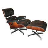 Rosewood Lounge Chair and Ottoman by Charles and Ray Eames