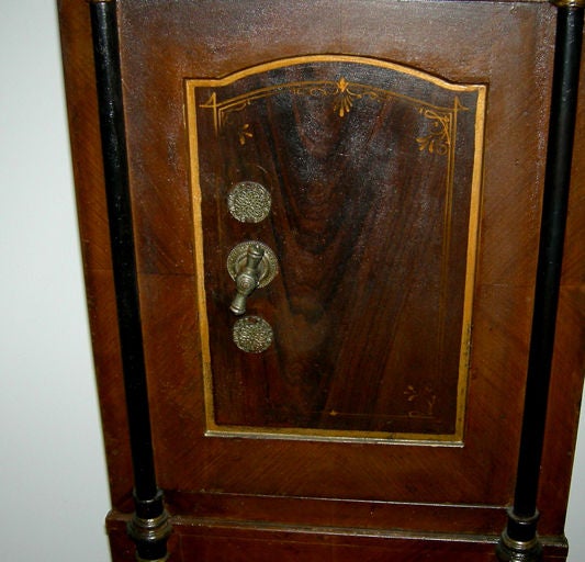Need a bank you can trust with your money? You won't have to worry about collapses with this solid, sturdy steel safe. Beautifully decorated with a painted wood grained finish, this home safe is both attractive and functional. Both keys work in the