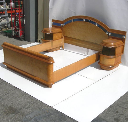This ocean liner inspired set only shows up once a decade, and we are very excited to once again have an example. The set is very complete, although the bench pictured is not available. The massive dressing mirror is the centerpiece of the set, and