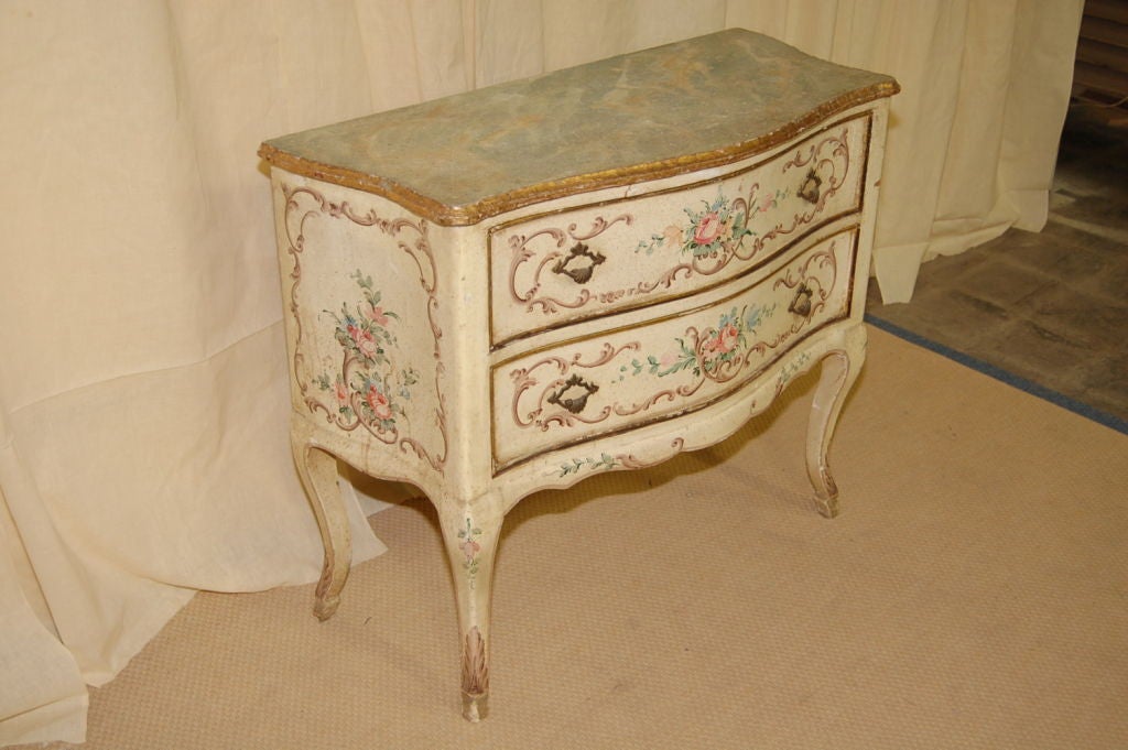 Small 1920s painted Italian commode with faux marble top.
Measures: 38.5'' W x 17.5'' D x 32.5'' H.
(also: chest of drawers, dresser, side table).