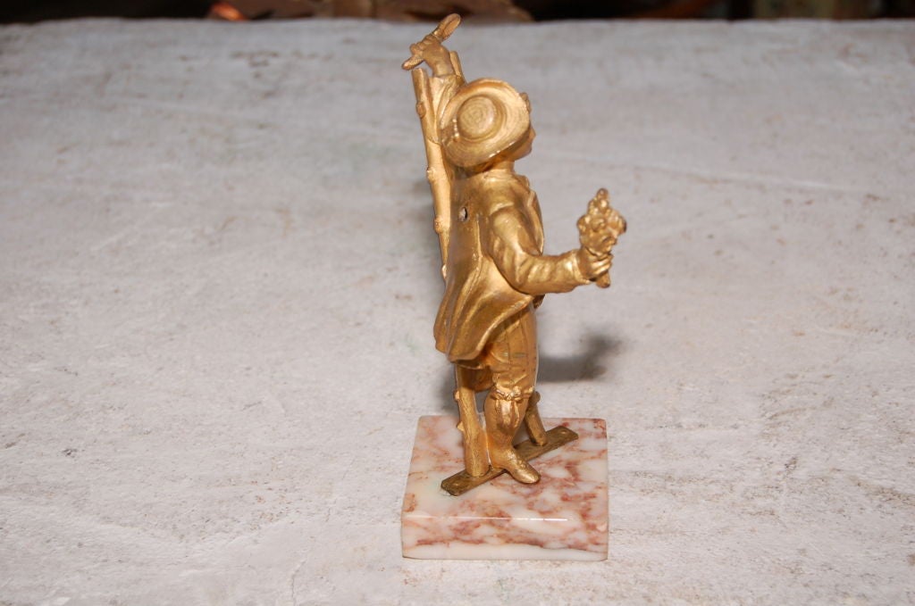 19th century bronze gold doré figurine sculpture.

Dimensions: 8'' H x 4'' W x 3'' D.