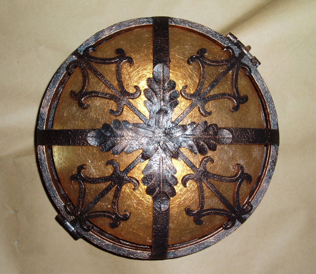 Reproduction Venetian ceiling dome light. Measures: 12'' W x 6.5'' H.
Some rust underneath because it was on the floor when we had some minor flooding.