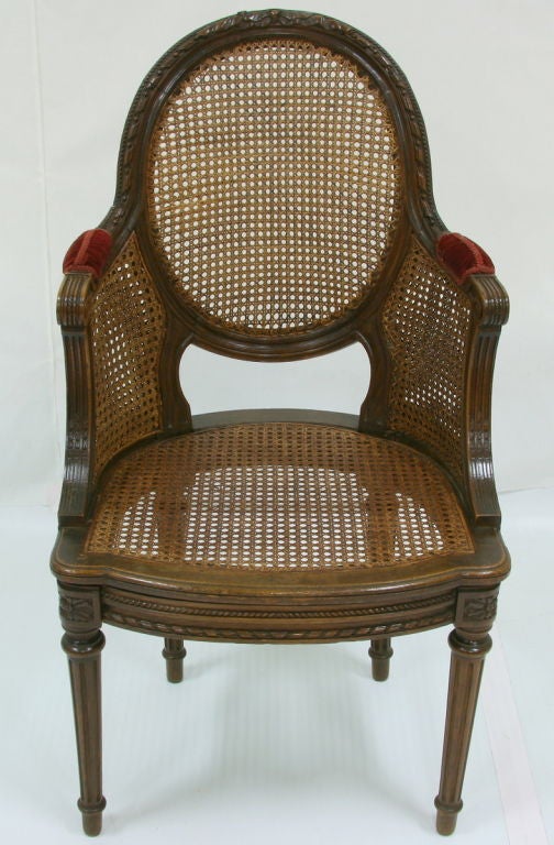 19th century French caned fauteuil Louis XVI style

Measures: 21'' W x 18.5'' D x 38'' H (16.75''seat).