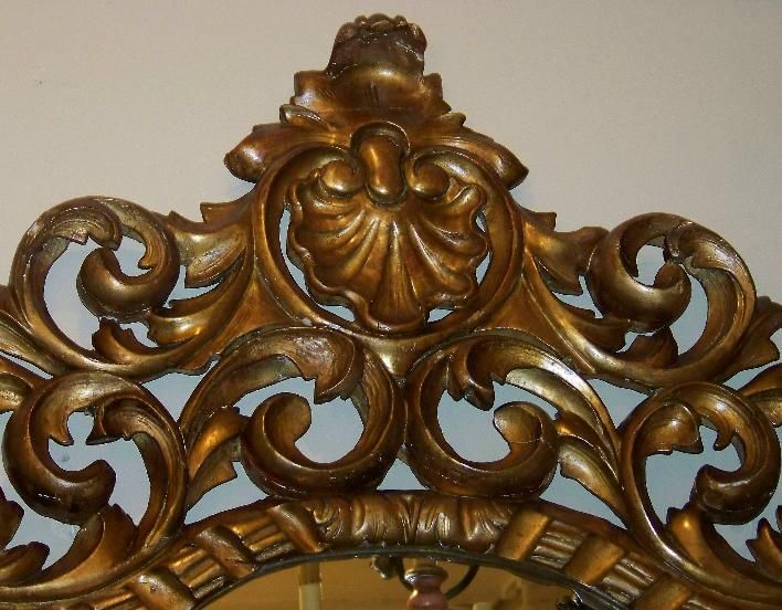 A large and elaborately hand-carved and painted Rococo style Italian mirror, Italy, mid-20th century.