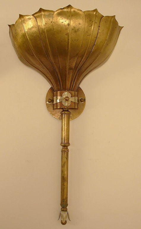 A great looking pair of hand made sconces by Grag Studios designed especially for Gumps. Brass patina finish with mixed metal accents. Signed, numbered and dated.