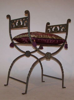 Masterfully wrought metal classic style X chair with original old bronze green painted finish with new silk velvet appliqued cushion.