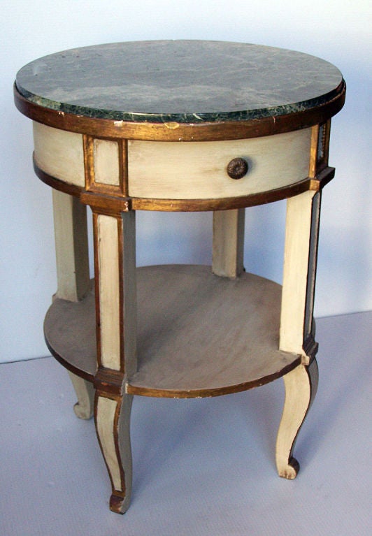 Useful round table with inset marble. Original paint and one drawer.