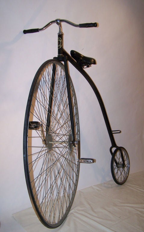 A very accurate, fully functioning, 1970's reproduction of a late 19th century hiwheel bicycle. The diameter below is of the large wheel.