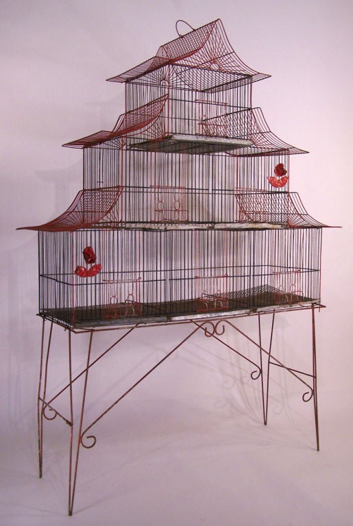 Interesting large pagoda shaped wire bird cage.
