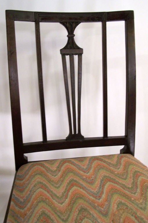 Matched pair of late 18th/early 19th century Irish Hepplewhite elmwood side chairs with removable seats.