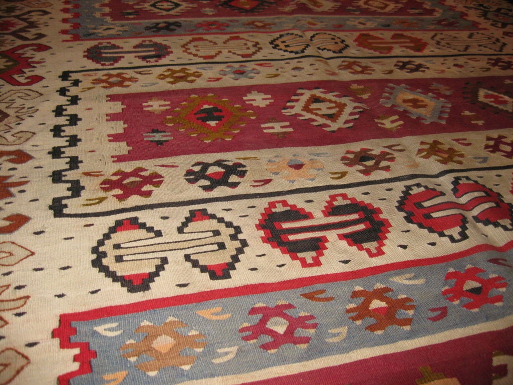 Handwoven and hand-dyed Kilim is made in Pirot. One of the oldest existing tapestry school in Europe. This Kilim is a large runner 13.5 feet.