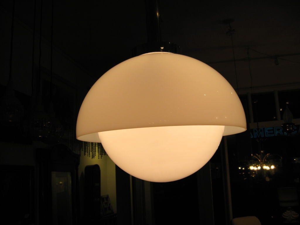 Designed by Vico Magistretti, made by Artemide.
 Large pendant ,adjustable height, light is in two parts milk glass and acrylic . Free shipping 