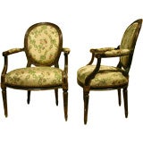 Pair Of French Louis XVI Painted And Gilt Fauteuils