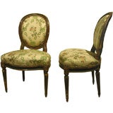 Set of Four Louis XVI Painted and Gilt Chaises