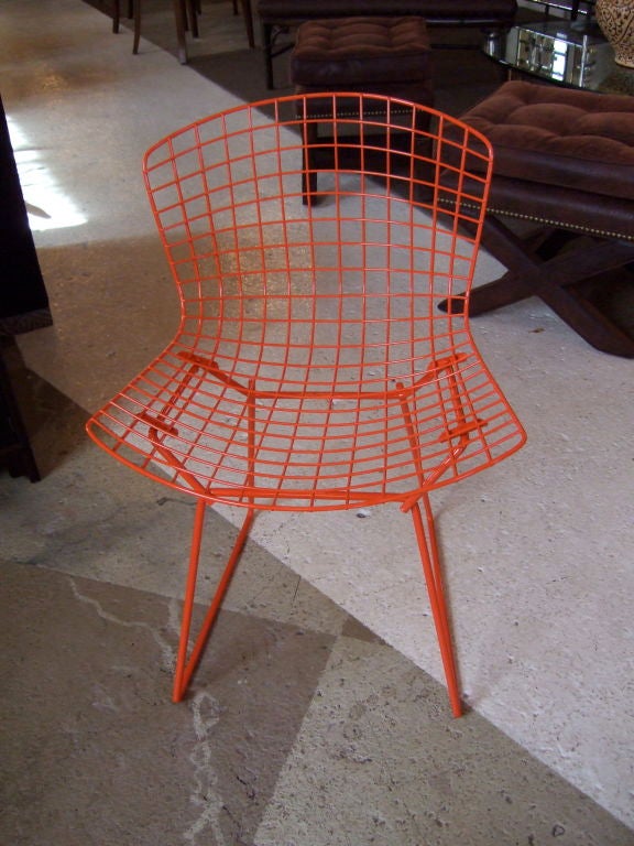 Pair Burnt Orange Bertoia Chairs, freshly powdercoated with faux suede snap-on cushions. Can be used inside or out.