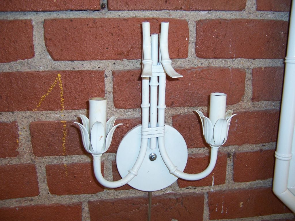 Pair Faux Bamboo Sconces with 2 lights each. Wired for use.