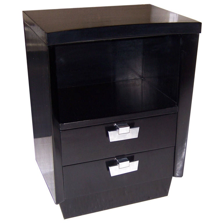 Ebonized curved front end table with polished nickel hardware. Two drawers.