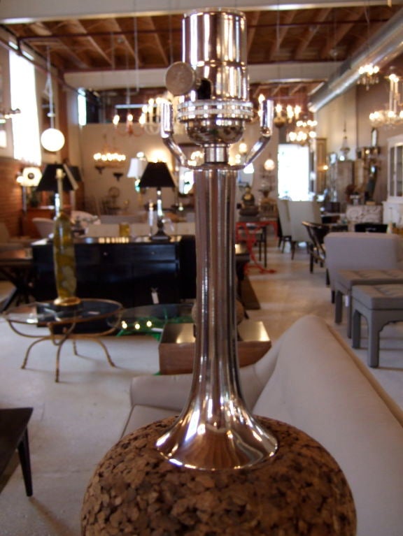 Art meets function with these magnificent lamps.  Cork is juxtaposed with chrome to creat a pair of fantastic lamps.