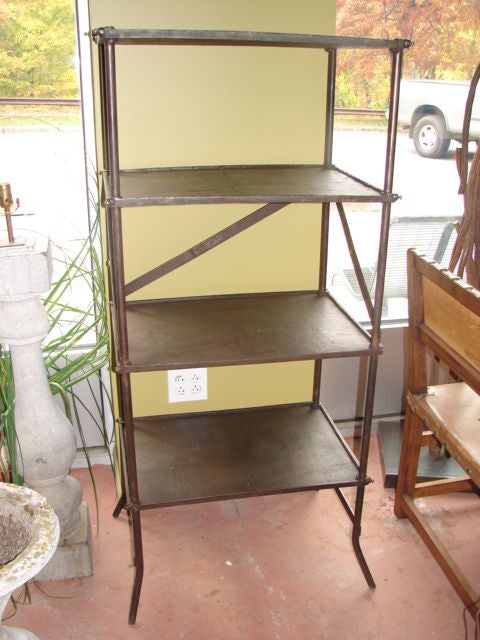 Pair of patinated steel etageres