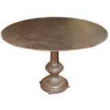 Cast iron pedestal round table