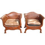 Pair of diminutive arts and crafts leather studded chairs