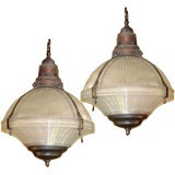 Pair of copper and bronze holophane hanging lights