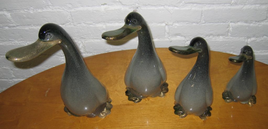 Sweet grouping of relatively large scale hand-blown glass ducks.  Perfect for a fan of the classic children's book Make Way For Ducklings.<br />
<br />
Heights from large to small:  13