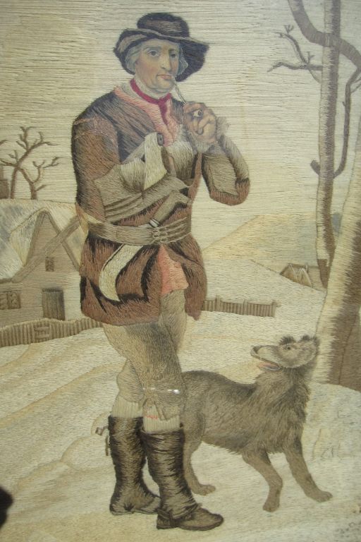 Stumpwork picture of a man and dog with wonderful detail, scale and perspective.