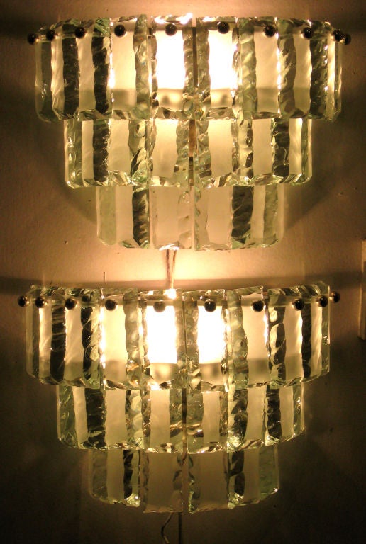 Remarkable pair of hand made Italian sconces