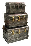 Fascinating set of three colonial steel and brass trunks