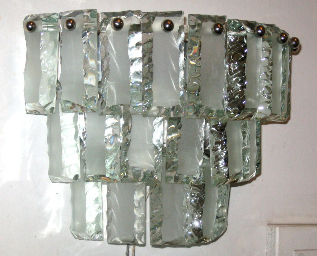 Remarkable pair of sconces