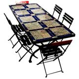 Used Italian Tiles table with 8 bistro chairs