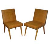 Pair of Robsjohn-Gibbins slipper chairs with straw upholstery
