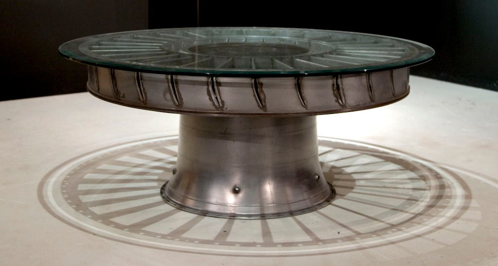 Industrial Coffee table out of a stator and J79 Bell. Glass Top, can be customized. 38 diameter, 17 inches high (measurements without glass top)